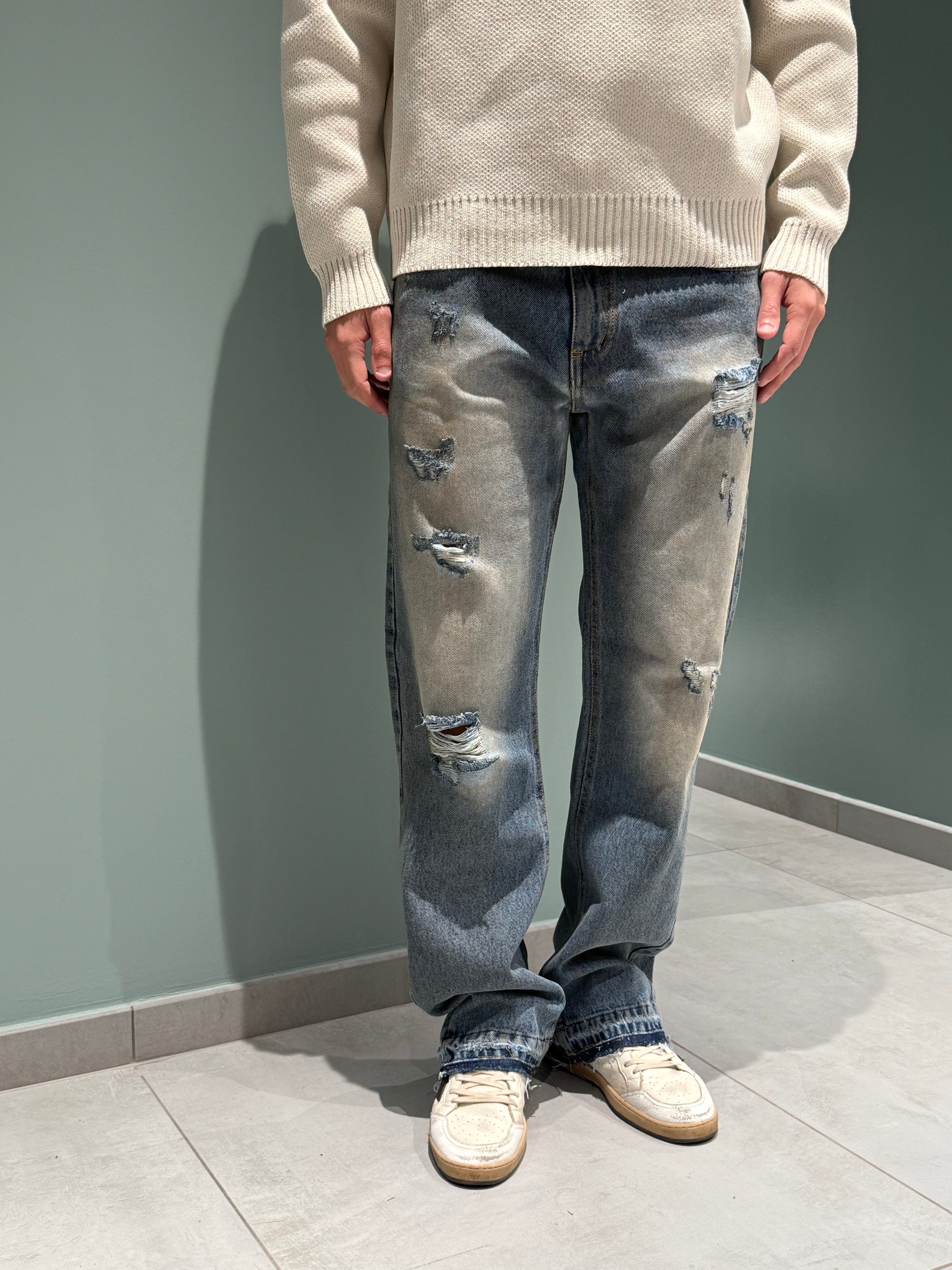 jeans flare rotture