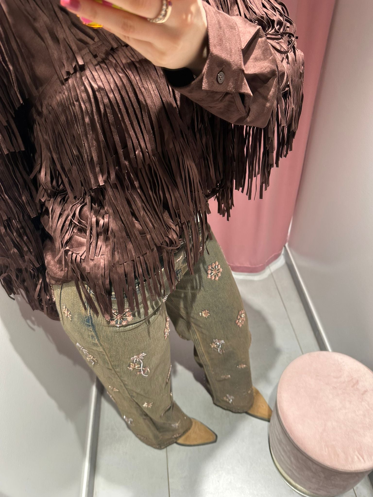 jeans invecchiato e paillettes