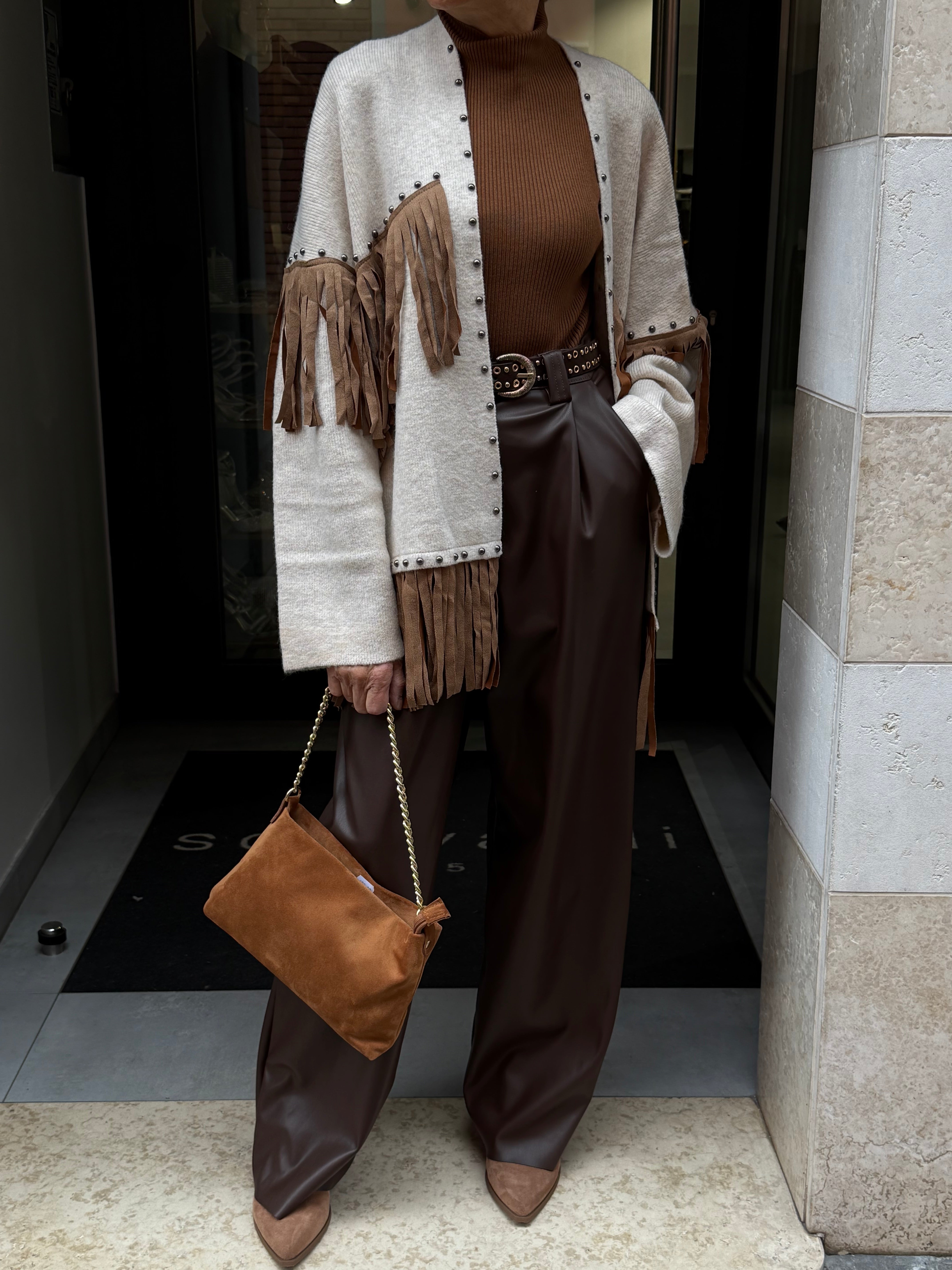 cardigan frangia e borchie