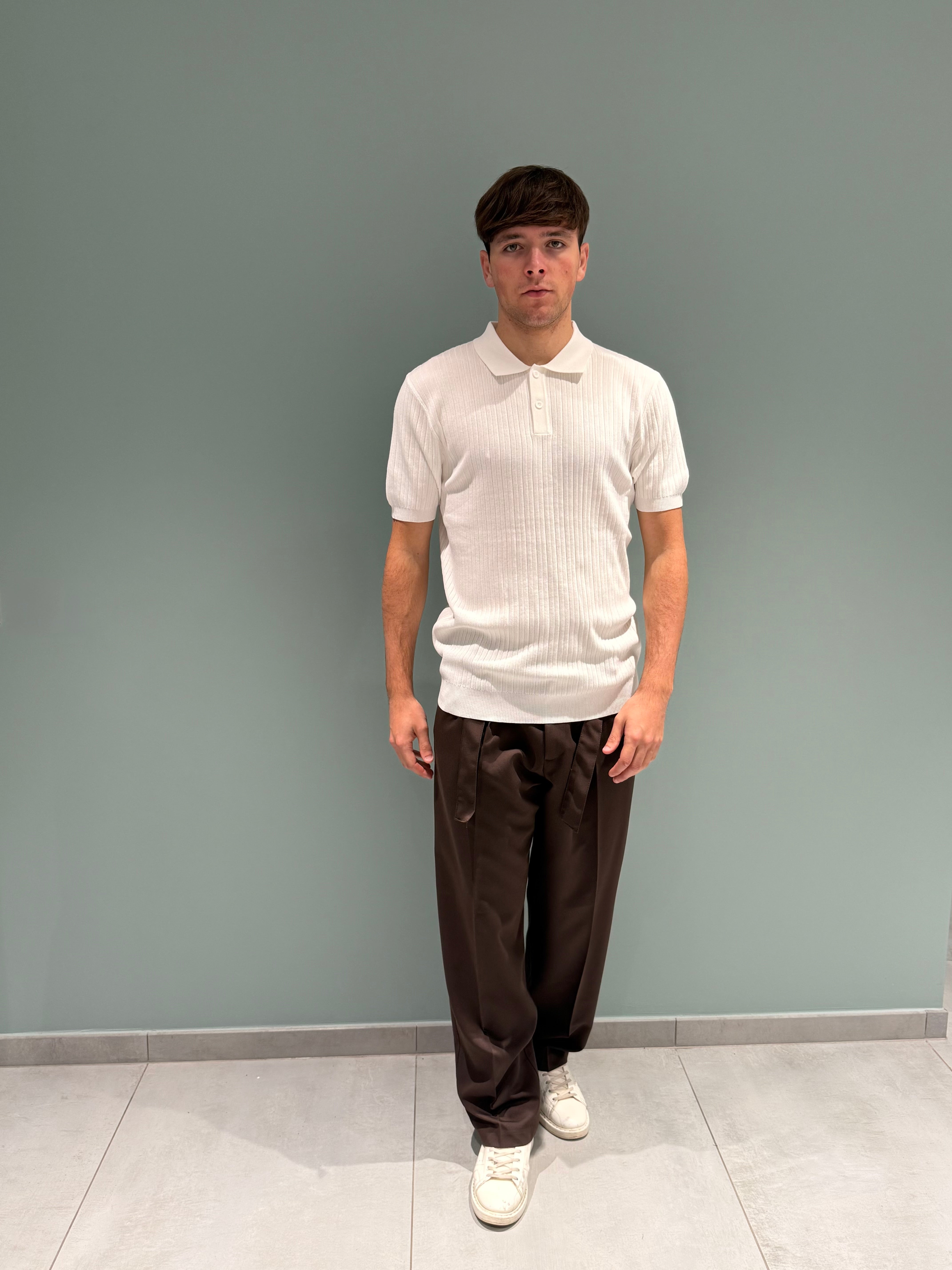 polo lavorata con bottoni