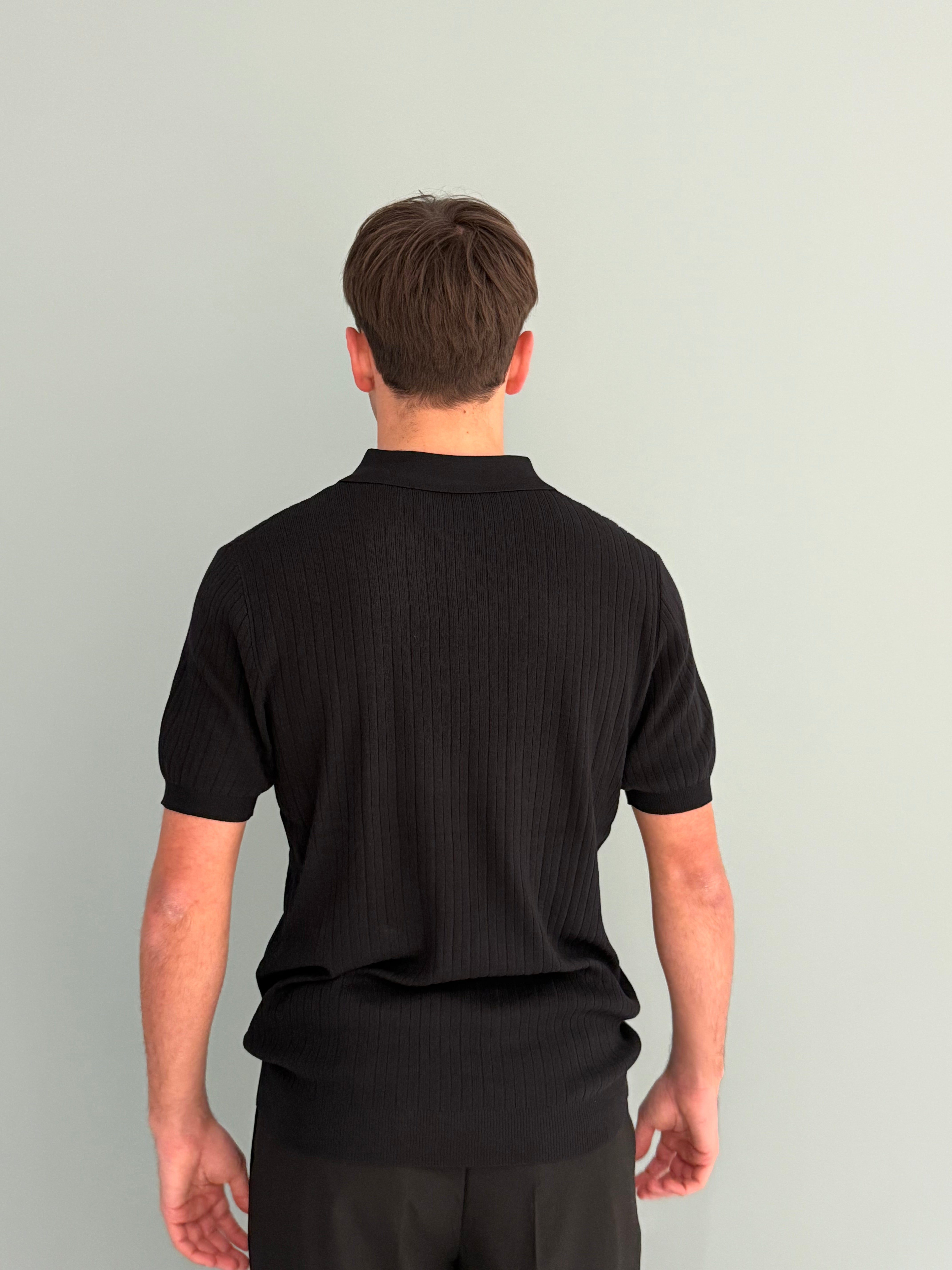 polo lavorata con bottoni