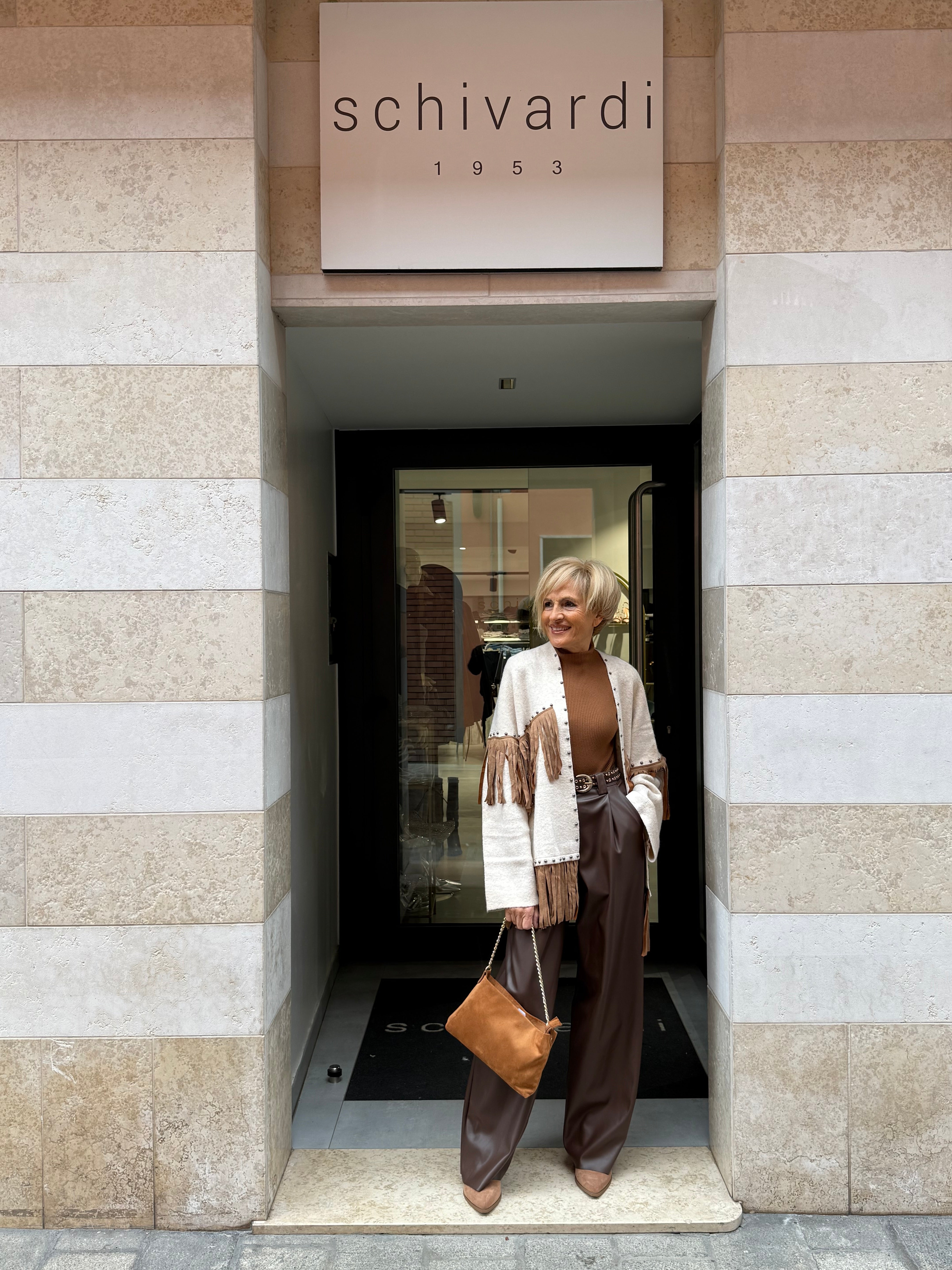 cardigan frangia e borchie
