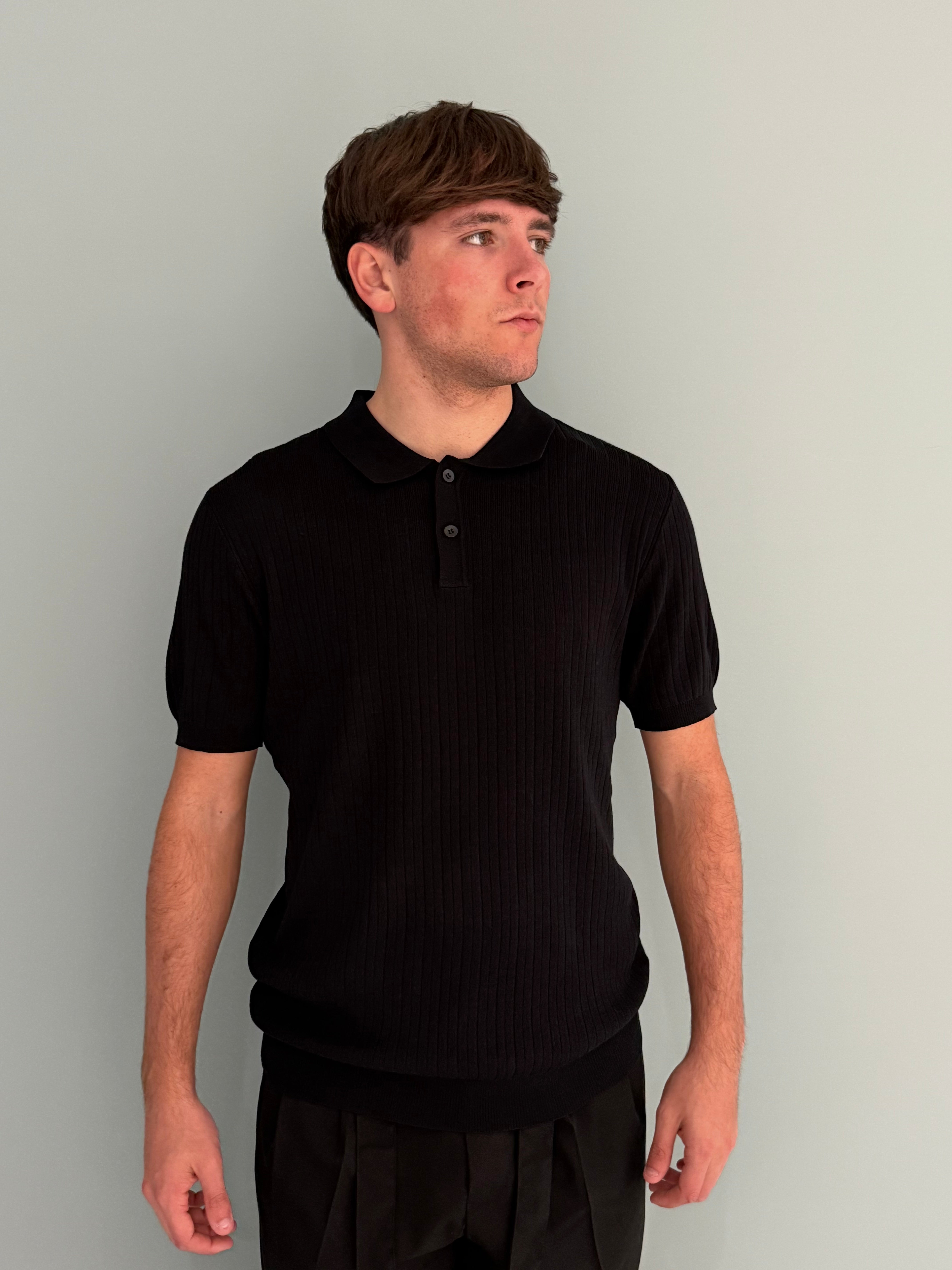 polo lavorata con bottoni