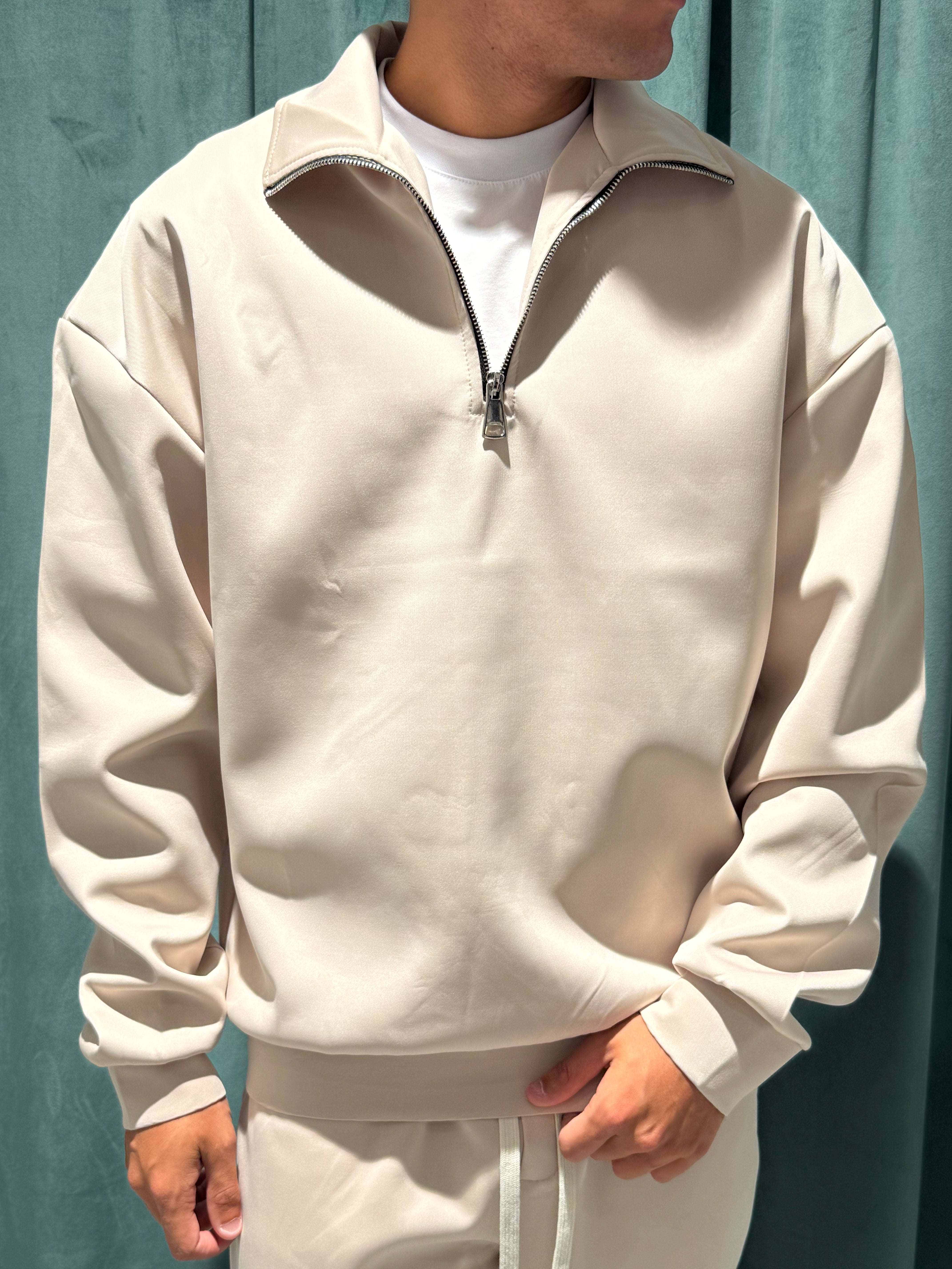 tuta polo zip