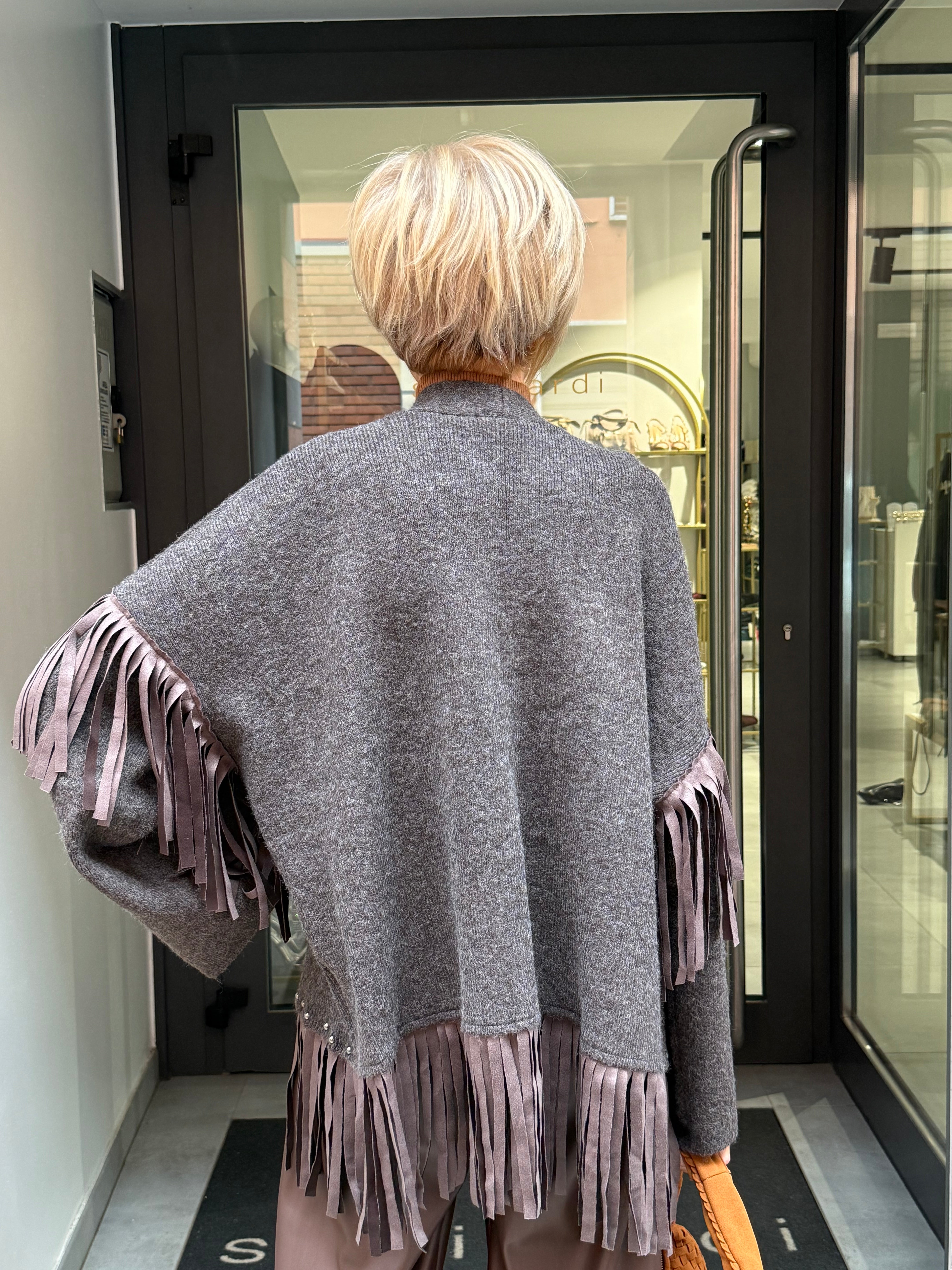 cardigan frangia e borchie