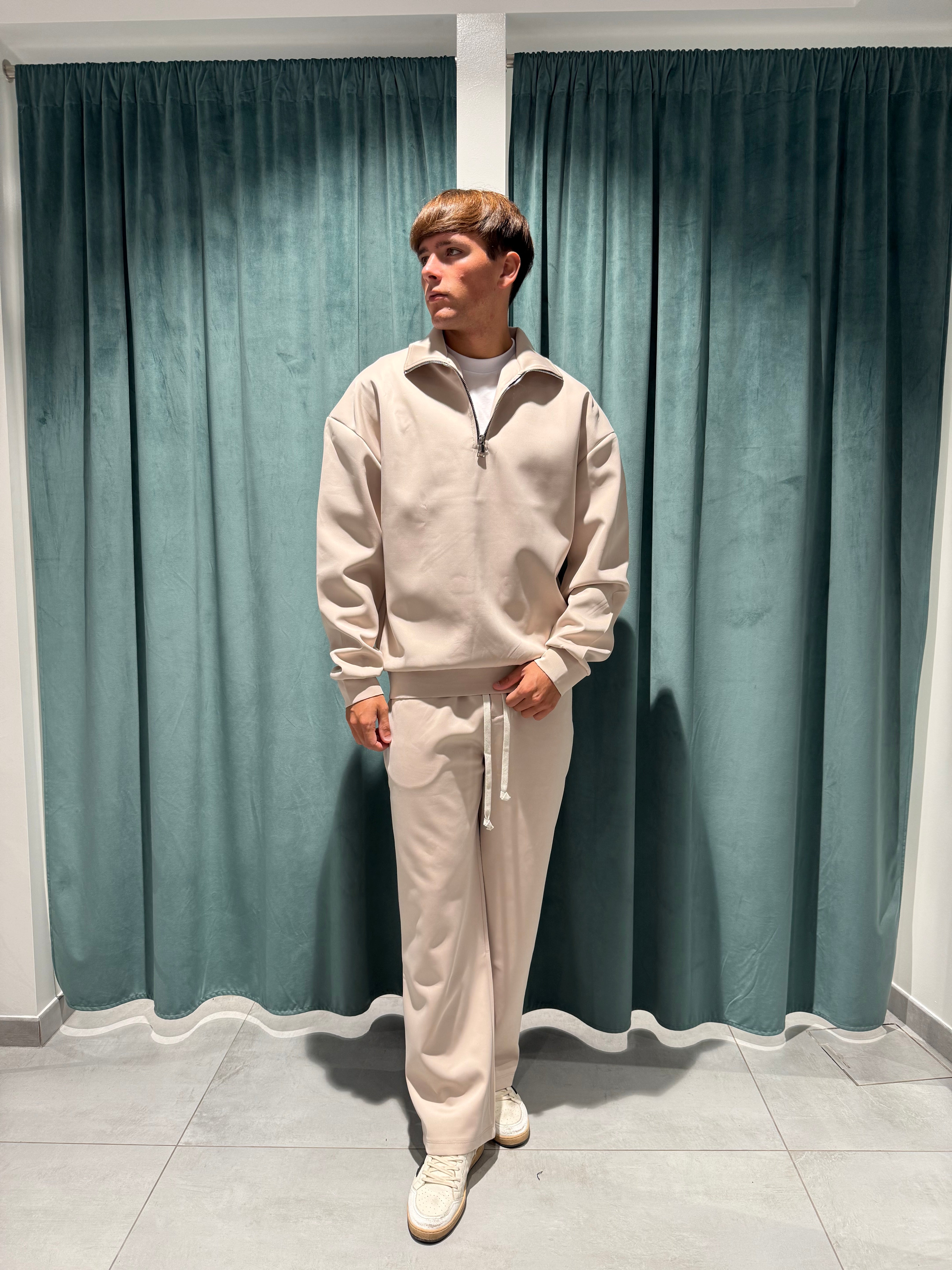 tuta polo zip
