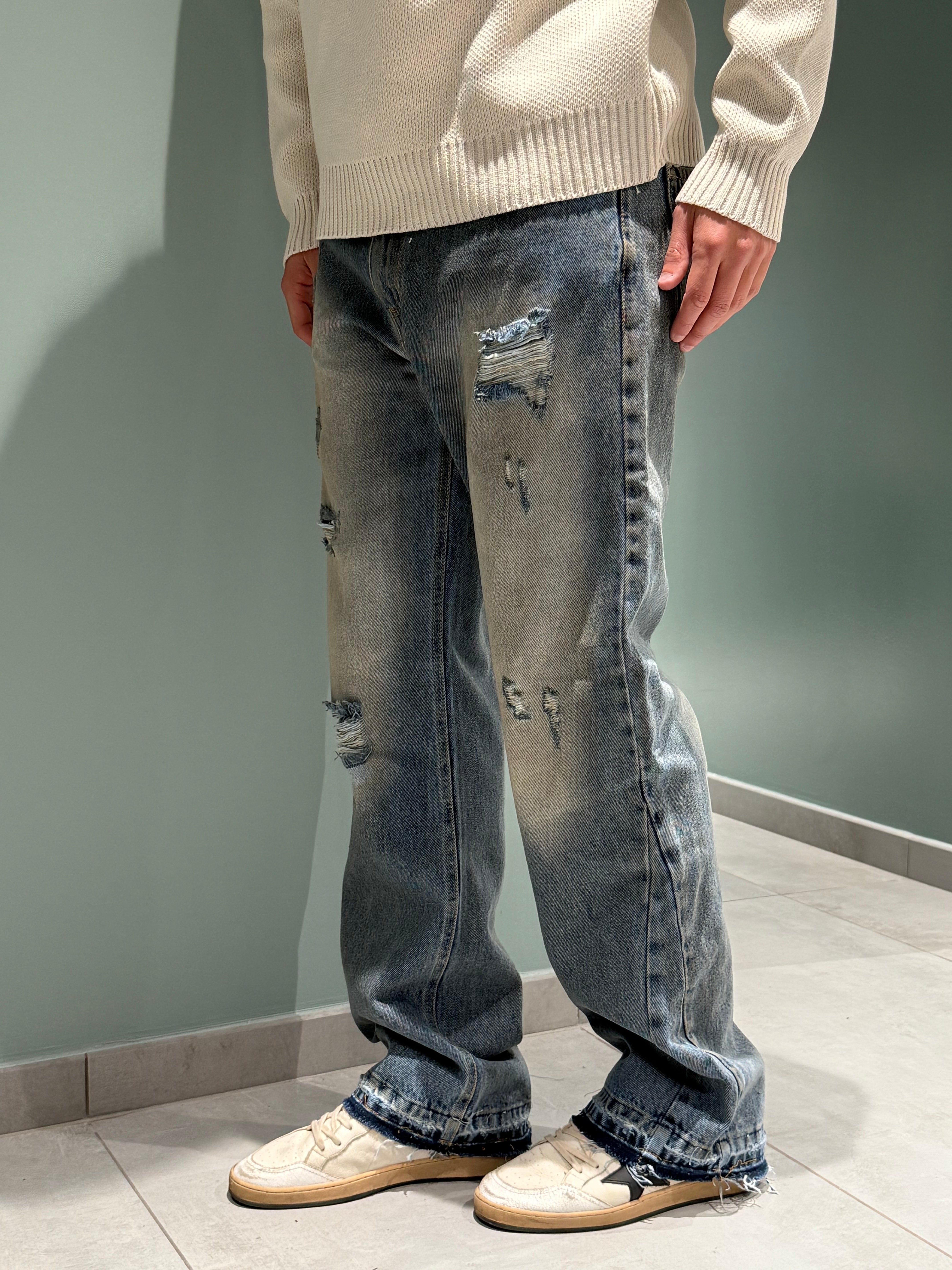 jeans flare rotture