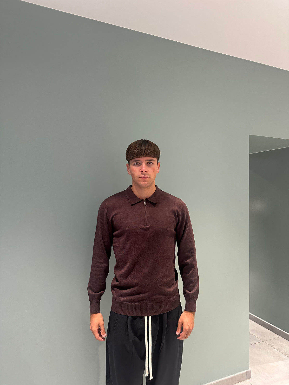 polo in filo con zip